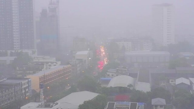 Aerial view of heavy rain, in the city, Bangkok Thailand.