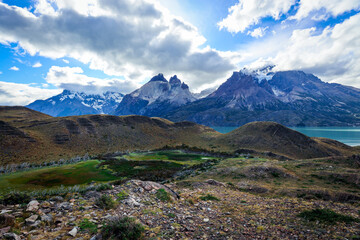 Bright Sun in the Blue Cloudy sky in the Torres Del Paine National Park, Chile