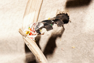 Concept: The danger of drilling through a electrical cable in the wall