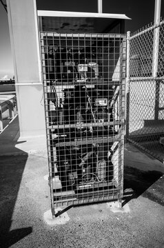 Water And Gas Meter Behind Fence