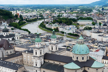 Fototapeta na wymiar Rooftops buildings cityscape of Salzburg. City view of Salzburg. Salzburg architecture landscape. Austria