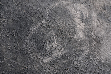 Grey background plaster wall background pattern with high resolution. The view from the top. A copy of the space.