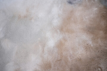 Fototapeta premium Abstract grunge wall surface. Old plaster texture. Creative and industrial background design. A dirty detail of a grainy pattern.