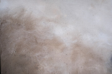 Abstract grunge wall surface. Old plaster texture. Creative and industrial background design. A dirty detail of a grainy pattern.