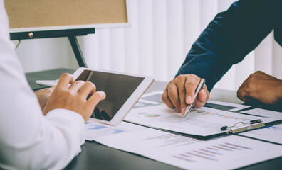 Two businessmen are helping to innovate and plan the business operations of the company.