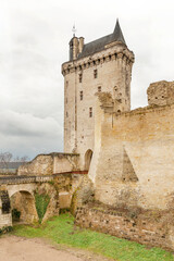 Fototapeta na wymiar The clock tower (La Tour de l Horloge), main entrance to famous Chinon castle in Loire valley, France