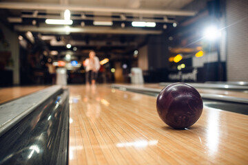 Close up of purple ball on the bowling alley