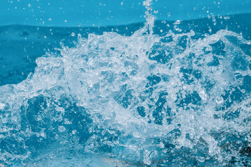 splash of blue water in the pool