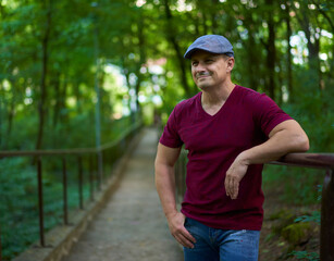 Handsome man in hat and tee