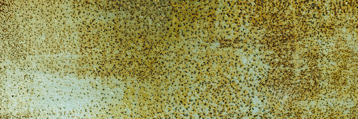 Abstract rusty metal background of painted metal texture with traces of corrosion. Panorama. Close up.