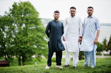 Group of pakistani man wearing traditional clothes salwar kameez or kurta. - obrazy, fototapety, plakaty