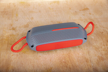 Bluetooth speaker on a wooden table