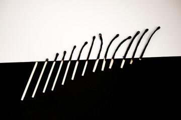 Different stages of match burning isolated on white and black background