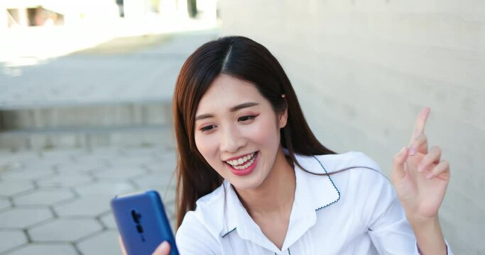 Asiian businesswoman has video chat