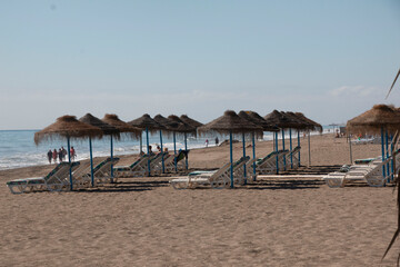View of Torremolinos beach with palm trees
typical
