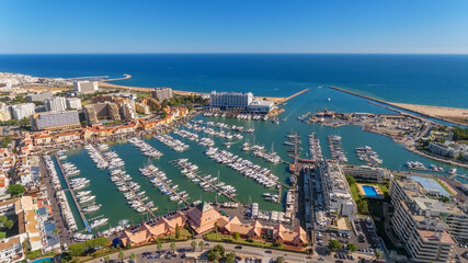 Fototapeta na wymiar Aerial photo of the bay, Vilamoura, Quarteira, Portugal. Marina with luxury yachts.