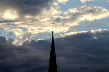 Church spire and clouds in Bonn, Germany