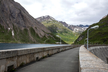 Fototapeta premium Morasco Lake (VCO), Italy - June 21, 2020: The landscape and Morasco Lake, Morasco Lake, Formazza Valley, Ossola Valley, VCO, Piedmont, Italy