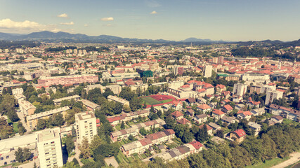 Fototapeta na wymiar Aerial view of a city with many apartman buildings.