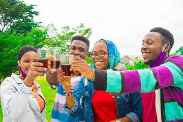 group of people feeling excited while having a drink