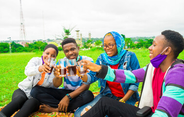 group of people feeling excited while having a drink