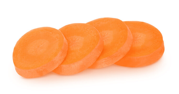 Fresh carrot slices isolated on a white background.