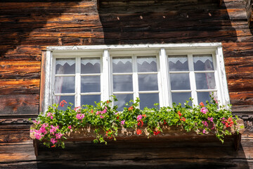 Canza (VCO), Italy - June 21, 2020: A window at Canza village, Formazza Valley, Ossola Valley, VCO, Piedmont, Italy