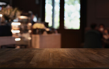 Wood Table Top in Blur Background room interior with empty copy space.