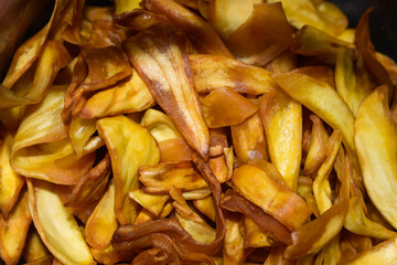 Close up shot of fried Jackfruit chips. South indian cuisine. Jackfruit chips fried in coconut oil.
