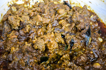 South Indian cuisine Kerala Style Beef curry / roast. Traditional style meat curry. Indian spicy curry. Selective focus photograph.