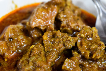 South Indian cuisine Kerala Style Beef curry / roast. Traditional style meat curry. Indian spicy curry. Selective focus photograph.
