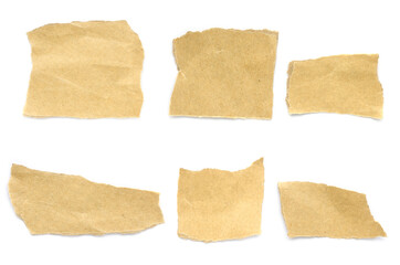 Recycled paper craft stick on a white background. Brown paper torn or ripped pieces of paper isolated on white background.	