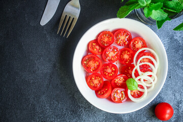 tomato salad vegetables Menu concept serving size. food background top view copy space organic healthy eating 
keto or paleo diet