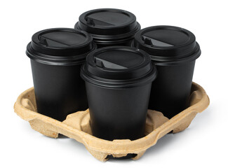 Four black takeaway cups of coffee in a tray on white background