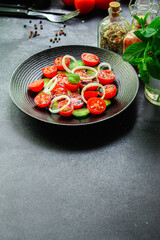 salad tomato cucumber vegetables Menu concept serving size. food background top view copy space for text organic vevegan eating