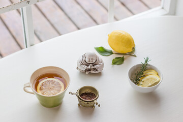 Cup of herbal tea with slice of lemon