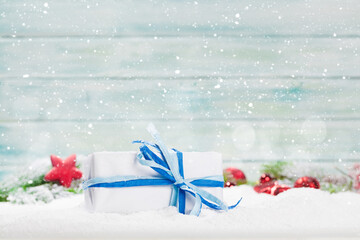 Christmas greeting card with decor and gift box