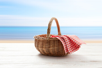 empty basket with red napkin picnic on table place