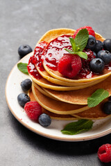 Delicious homemade pancakes with summer berries