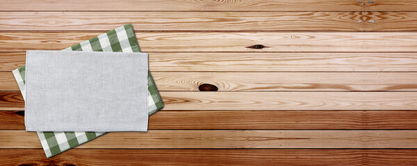 Empty wooden deck table with napkin tablecloth