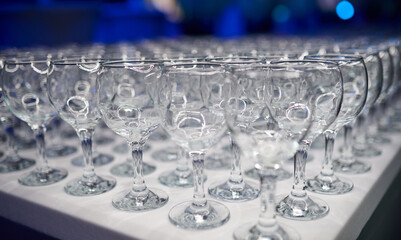 Many Empty glasses of wine and cocktails on the table
