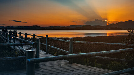 Obraz premium sunset over the river