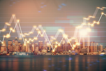 Financial graph on night city scape with tall buildings background double exposure. Analysis concept.