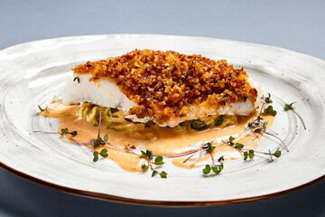 Baked cod fillet with sauce