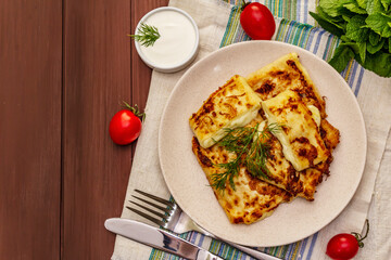 Hot appetizer - pita bread with cheese and herbs. Vegetarian healthy food