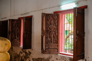 window with red shutters