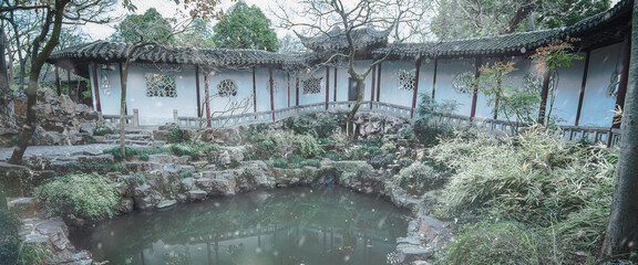 The winter snowing entrance at Canglang Pavilion(Cang Lang TÃ­ng) built on 1045 is a classic garden and famous landmark at Suzhou,Jiangsu,China.