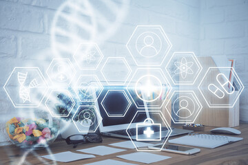 Desktop computer background and DNA drawing. Double exposure. Science concept.