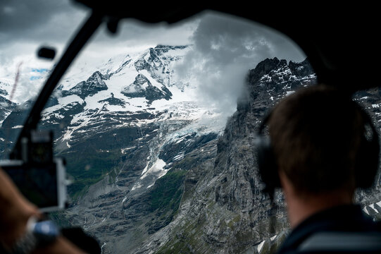 aerial view of a glacier in the Bernese Alps with a helicopter pilot