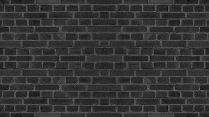 Fototapeta na wymiar Dark black painted brick stone masonry wall texture background wallpaper